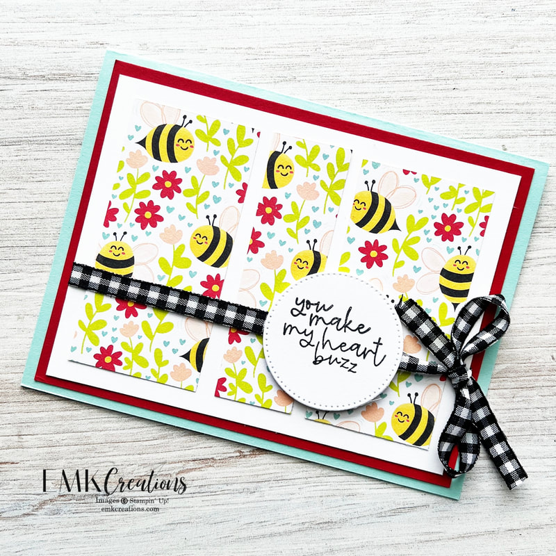 card featuring bees and flowers on printed paper on blue base with black and white checked ribbon by EMK Creations