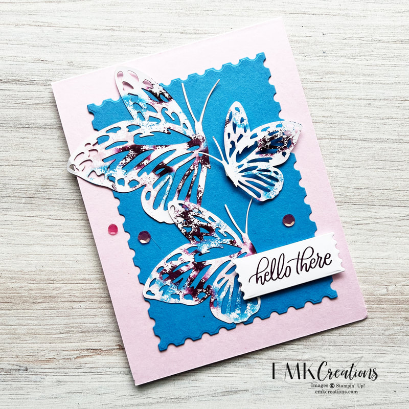 hello there card with pink base and blue die cut with multi colored butterflies by EMK Creations